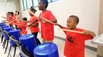 West Charlotte children playing drums.