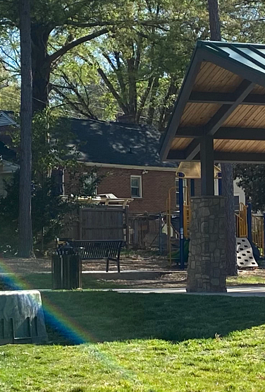 Enderly Park with the park sign and picnic shelter in the background