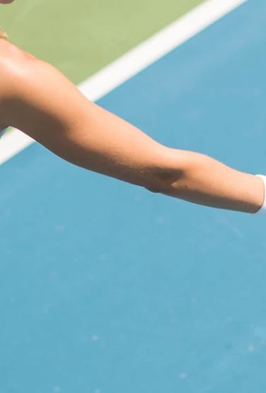 PRK-woman-playing-Tennis